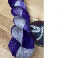 Variegated skein in deepest purple and silver.