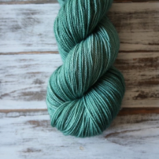 Medium blue green semisolid yarn.