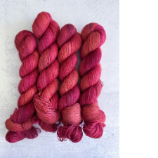 Gorgeous darker red tonal yarn.
