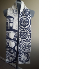Left side of scarf image has the Tardis and overlapping clock faces. Right side shows the doctor’s name in Gallifreyan.