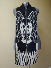 High contrast scarf of a very scary Weeping Angel statue from Doctor Who, the kind that sneaks up on you if you blink. The left and ride sides of the scarf form the combined picture.