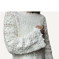 Long-sleeve sweater with openwork stripes. All edges have picot style edges.