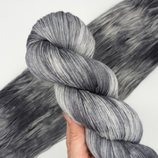 Tonal yarn in shades of gray with a bit of white.