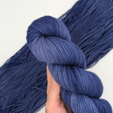 Semisolid cornflower-blue yarn.