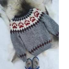 The sweater that started it all, the Wilderness sweater has a yoke with large dog pawprings, with diamond shapes above, below and at the hem and cuffs.